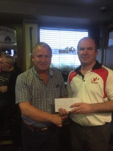 A happy Vincent receives his Rossmore prize from Captain Liam.